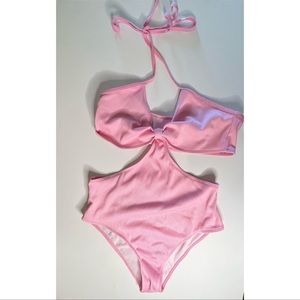 One piece swim suit with side cutouts